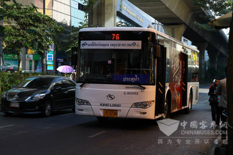 King Long XMQ6106G CNG buses driving in Bangkok